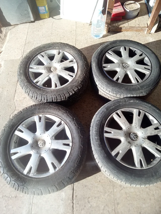 Volkswagen (OEM) TOUAREG  · 18x8.0 5x120 ET57 · General Tire 255/55 R18 · x4